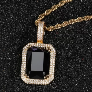 Make a bold statement with the Yellow Gold Black Gemstone Pendant, featuring a sleek, dark gemstone framed by VVS simulated diamonds. Set in a Yellow Gold-plated frame, this pendant blends mystery and sophistication with a modern Hip Hop twist. Hypoallergenic and durable, it’s designed for everyday wear or special occasions, offering a versatile look that transitions easily between casual and formal outfits. The Yellow Gold finish highlights the depth of the black gemstone, creating a standout piece for any jewelry lover.