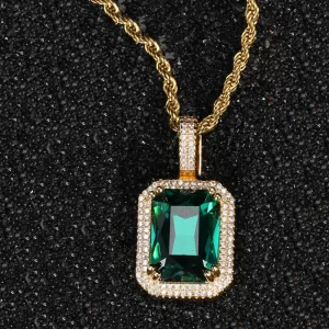 Turn heads with the Yellow Gold Emerald Stone Pendant, featuring a vibrant green emerald gemstone surrounded by VVS simulated diamonds. Set in a Yellow Gold-plated frame, this pendant adds a fresh, luxurious touch to any outfit. Hypoallergenic and water-resistant, it’s designed for everyday wear while maintaining its brilliance. Whether you're dressing up for a formal event or adding a pop of color to your casual look, the Yellow Gold finish and bold green stone create the perfect blend of Hip Hop style and elegance.