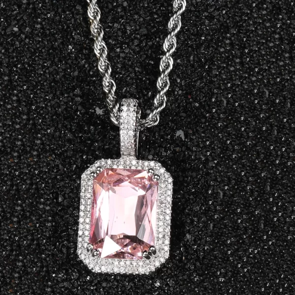 For a cooler, more modern look, the White Gold Pink Stone Pendant offers the same feminine elegance with a sleek finish. Featuring a radiant pink gemstone surrounded by VVS simulated diamonds, this pendant is plated in White Gold for a contemporary edge. Hypoallergenic and designed for comfort, it’s perfect for daily wear or special occasions, bringing both elegance and bold Hip Hop style to any outfit.