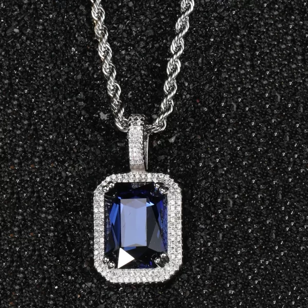 Elevate your style with the White Gold Indigo Sapphire Stone Pendant, featuring a deep blue sapphire gemstone encased in a sleek White Gold-plated frame. Surrounded by VVS simulated diamonds, this pendant exudes elegance and sophistication. Hypoallergenic and scratch-resistant, it’s perfect for any occasion, bringing a refined touch to both casual and formal outfits. The White Gold finish enhances the richness of the sapphire, making it a timeless addition to any Hip Hop jewelry collection.