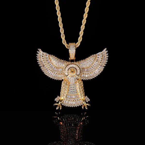 The Iced Eagle Pendant in Yellow Gold is a bold symbol of power and freedom. Crafted from gold plating and encrusted with diamonds, this pendant exudes confidence and luxury. Its hypoallergenic, waterproof, and scratch-resistant features make it perfect for everyday wear while capturing attention with its intricate details. Ideal for those who appreciate fine craftsmanship, this piece is a standout in any jewelry collection and a perfect gift for someone who values strength and independence in Hip Hop style.