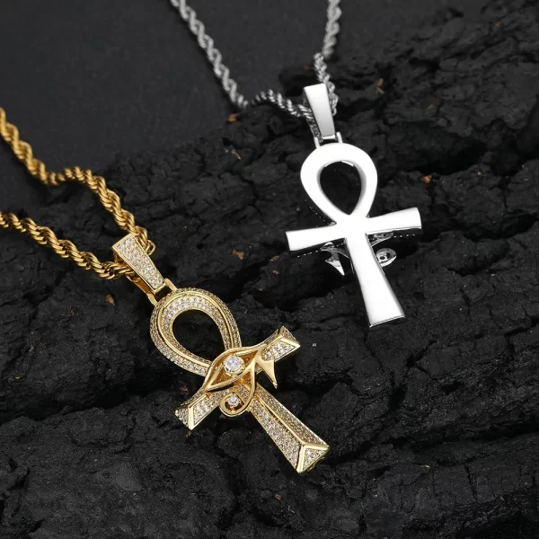 In White Gold, the Eye of Ra Ankh Cross Pendant offers a stunning combination of ancient symbolism and modern flair. This pendant is encrusted with VVS simulated diamonds, giving it a radiant sparkle that shines in any light. The White Gold plating provides a sleek and refined touch, perfect for daily wear or special events. Its hypoallergenic, waterproof, and scratch-resistant properties make it as durable as it is stylish. Whether you're honoring ancient culture or adding a unique element to your Hip-Hop style, this pendant is a must-have for any jewelry collection.