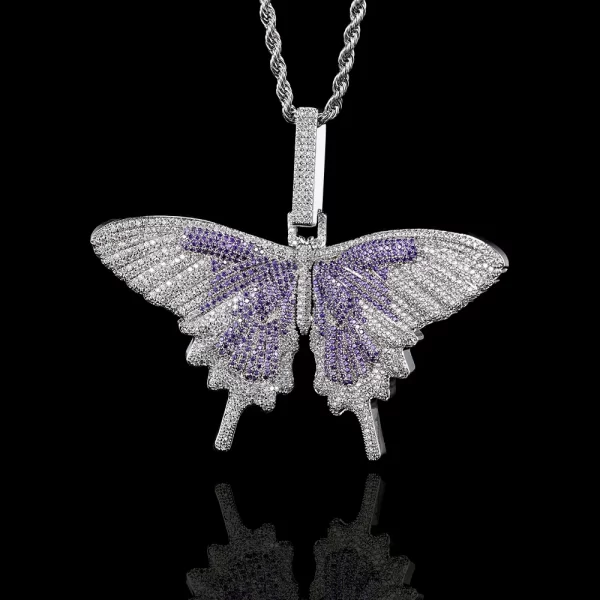 The Iced Butterfly Pendant in White Purple is a unique blend of elegance and subtle color. The White Purple plating adds a soft, sophisticated touch, while the shimmering stones bring a vibrant sparkle. Hypoallergenic, waterproof, and scratch-resistant, this pendant is perfect for everyday wear or as a special gift. Its delicate design and unique color make it a standout piece for those who love stylish, versatile accessories with a touch of Hip Hop flair.