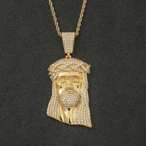 This Iced Jesus Pendant in Yellow Gold is the ultimate fusion of faith and Hip-Hop style. Encrusted with sparkling VVS simulated diamonds, this pendant creates a bold, reflective surface that commands attention. The Yellow Gold plating adds a luxurious touch, making it perfect for everyday wear or special occasions. Waterproof, hypoallergenic, and scratch-resistant, this piece is designed for long-lasting durability, offering both style and meaning. Whether worn for religious reasons or as a statement piece, this pendant captures the essence of Hip-Hop culture with its bold design, making it an essential addition to your collection.