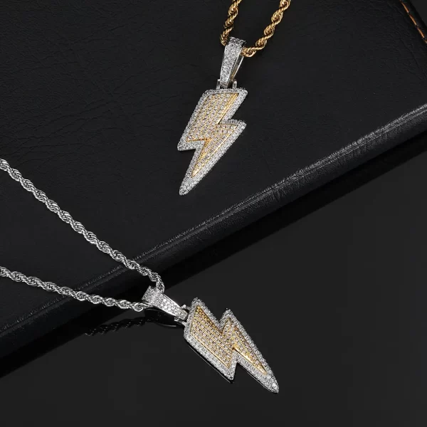 Bring the power of lightning to your style with this Iced Lightning Pendant in Yellow Gold. Featuring a sleek lightning bolt design encrusted with sparkling stones, this pendant is bold and eye-catching. The Yellow Gold plating ensures both durability and shine, while the waterproof, scratch-resistant, and hypoallergenic features make it perfect for everyday wear or special occasions. The iced-out stones add an electrifying touch, ensuring you stand out in any crowd. Ideal for anyone looking to express their bold Hip-Hop style with a striking piece of jewelry.