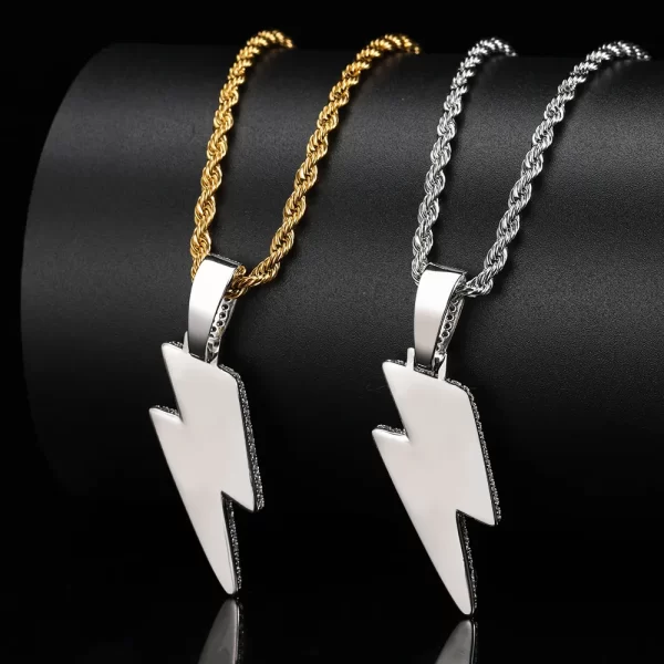 The Iced Lightning Pendant in White Gold brings an electric spark to any outfit. Its lightning bolt design is encrusted with brilliant stones, adding a luxurious touch to the bold White Gold finish. Hypoallergenic and scratch-resistant, it’s designed for comfort and longevity, making it perfect for both everyday wear and special occasions. Whether you're hitting the streets or attending a party, this pendant offers a dynamic statement piece that embodies Hip-Hop style.