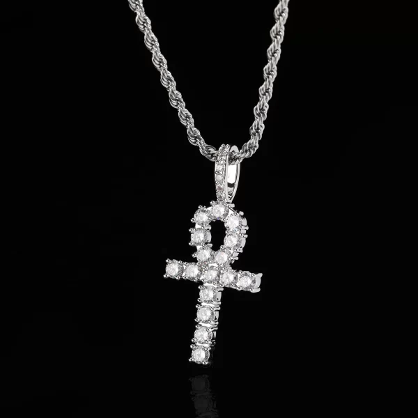 The Iced Ankh Cross Pendant in White Gold offers a refined take on this ancient Egyptian symbol, combining VVS simulated diamonds with a sleek, modern look. The White Gold plating adds an extra touch of luxury, while the hypoallergenic, waterproof, and scratch-resistant design ensures lasting durability. Perfect for both casual and formal wear, this pendant makes a bold statement of faith and style. Whether you're adding it to your streetwear or wearing it solo for a special occasion, the White Gold Iced Ankh Cross Pendant is a timeless accessory with deep cultural significance.