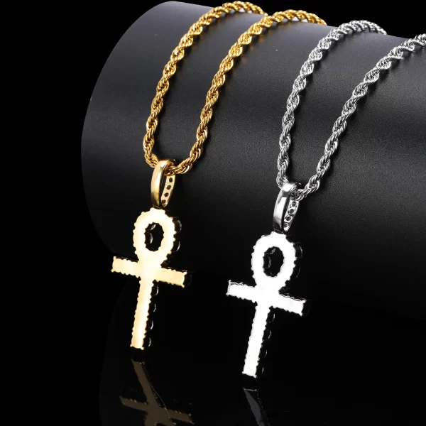 The Iced Ankh Cross Pendant in Yellow Gold blends ancient Egyptian symbolism with a fresh Hip-Hop aesthetic. Encrusted with VVS simulated diamonds, this 37mm pendant shines with a radiant, iced-out look that¡¯s perfect for making a statement. The Yellow Gold plating adds warmth and luxury, while the waterproof and hypoallergenic properties ensure comfort for everyday wear. Whether you're rocking it at a party or elevating your streetwear style, this piece offers a bold expression of faith, culture, and style. Durable and scratch-resistant, it¡¯s built to last, making it a must-have for any Hip-Hop jewelry collection.