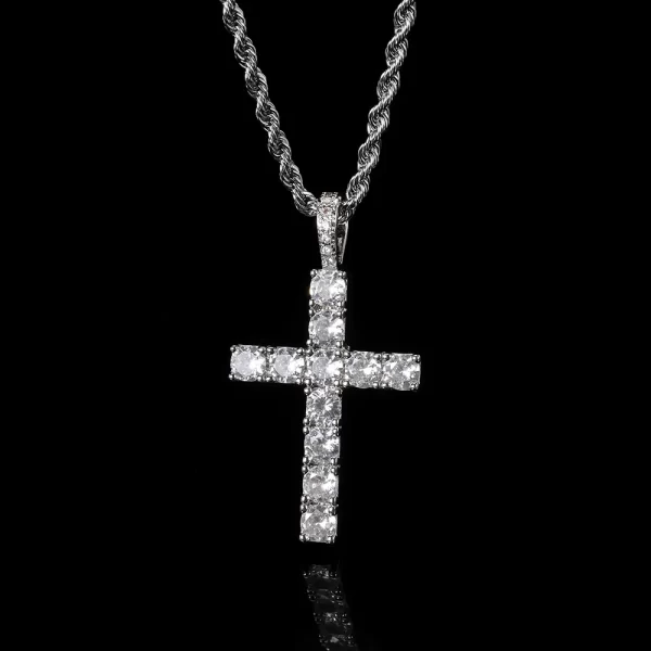 The White Gold Iced Prong Cross Pendant provides a cooler, modern twist on this timeless design. Set with VVS simulated diamonds in a White Gold-plated cross, this pendant adds sleek sophistication to your Hip Hop look. Hypoallergenic and durable, it¡¯s built for both everyday wear and special occasions. The cool tones of the White Gold finish perfectly complement the shine of the diamonds, making this pendant a versatile addition to any jewelry collection.