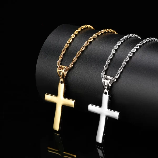 he Iced Prong Cross Pendant in White Gold offers a sleek and modern twist on the classic cross design, encrusted with VVS simulated diamonds for maximum shine. The White Gold plating adds an extra touch of refinement, making it perfect for anyone wanting to embrace both faith and urban luxury. Durable, waterproof, and hypoallergenic, this piece is built to last through any occasion, whether you¡¯re out at a formal event or rocking your hip-hop style daily. This iced pendant is the perfect finishing touch for any bold and stylish look.