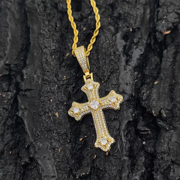 This Iced Cross Pendant in Yellow Gold offers a modern twist to a classic symbol of faith. Encrusted with dazzling stones, the cross catches the light from every angle, adding a touch of brilliance to your Hip-Hop style. Crafted in high-quality Yellow Gold plating, it's hypoallergenic, waterproof, and scratch-resistant, making it suitable for daily wear or special occasions. Whether you're expressing your faith or adding a standout piece to your collection, this pendant provides the perfect mix of luxury and meaning with its bold yet elegant look.