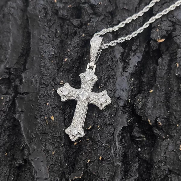 The White Gold Iced Cross Pendant delivers a refined, classic symbol of faith with a modern edge. Adorned with sparkling stones, it adds brilliance to any outfit. Hypoallergenic and waterproof, this White Gold pendant ensures long-lasting durability while keeping its scratch-resistant surface intact. Whether worn for casual or formal occasions, this cross pendant offers a statement of faith, elegance, and style. Its bold design and premium craftsmanship make it a must-have piece for any Hip-Hop jewelry collection.