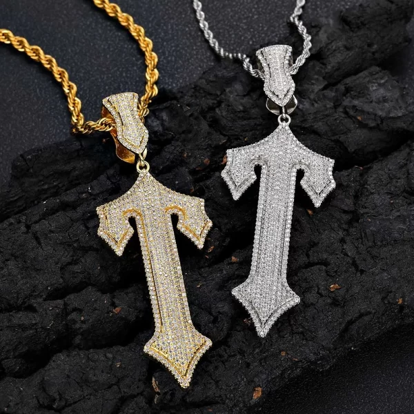 The White Gold Iced Sword Cross Pendant combines intricate craftsmanship with bold symbolism. With shimmering diamonds and white gold plating, this piece offers a luxurious way to express your personal style. Hypoallergenic and waterproof, it’s perfect for daily wear while adding a touch of elegance to your Hip Hop-inspired collection.