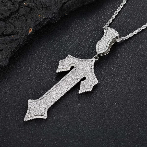 The White Gold Iced Sword Cross Pendant combines intricate craftsmanship with bold symbolism. With shimmering diamonds and white gold plating, this piece offers a luxurious way to express your personal style. Hypoallergenic and waterproof, it’s perfect for daily wear while adding a touch of elegance to your Hip Hop-inspired collection.