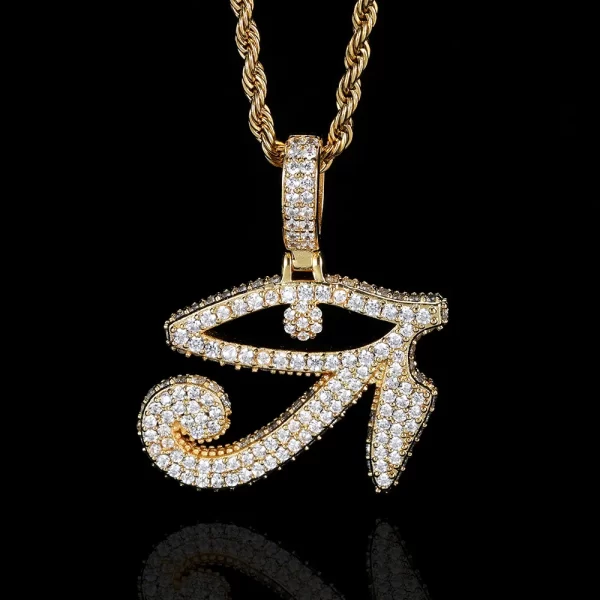 Channel ancient Egyptian vibes with this stunning Iced Eye of Ra Pendant in Yellow Gold. The gold-plated design features the iconic Eye of Ra symbol, encrusted with shimmering stones for an extra touch of bling. This hypoallergenic, waterproof, and scratch-resistant pendant is perfect for daily wear, ensuring it remains a dazzling piece in your collection. The symbol, representing protection and power, makes it not only a stylish accessory but also a meaningful one. Ideal for those who love bold and historical designs with a Hip Hop twist.