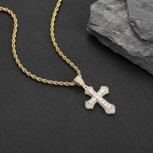 Add a blend of elegance and faith to your collection with the Yellow Gold Iced Baguette Cross Pendant. This pendant features baguette-cut simulated diamonds set in a Yellow Gold-plated cross, giving it a luxurious and refined look. The hypoallergenic and scratch-resistant finish ensures durability, making it suitable for everyday wear or special occasions. Perfect for anyone seeking to combine spirituality with Hip Hop fashion, this Yellow Gold piece makes a bold statement that will elevate any outfit.