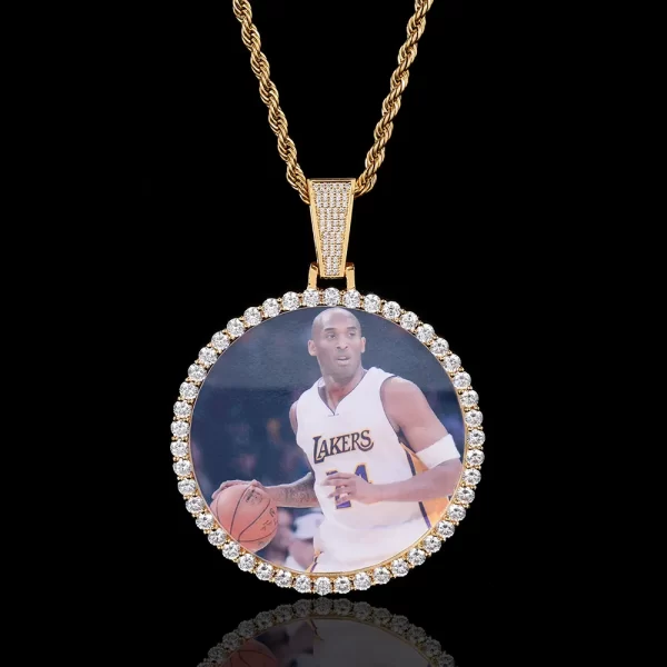 Create a bold statement with the Yellow Gold Custom Picture Pendant. This large 68mm pendant is the perfect canvas for your favorite photo, framed in luxurious Yellow Gold plating and accented with VVS simulated diamonds. Hypoallergenic, waterproof, and scratch-resistant, this pendant is designed for those who want to celebrate their most cherished memories in style. Whether for casual wear or special occasions, the Yellow Gold finish adds warmth and elegance to this standout piece in your Hip Hop jewelry collection.