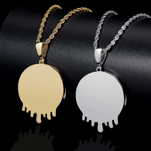 Personalize your style with this Custom Droplets Picture Pendant in Yellow Gold. Measuring 36mm and adorned with high-quality gold plating, this pendant offers a unique way to showcase cherished memories, making it a perfect gift for special occasions or as a meaningful keepsake. With its hypoallergenic, scratch-resistant, and waterproof design, this piece is built for both comfort and durability. Whether for yourself or a loved one, this custom pendant adds a personal touch to any Hip Hop jewelry collection.