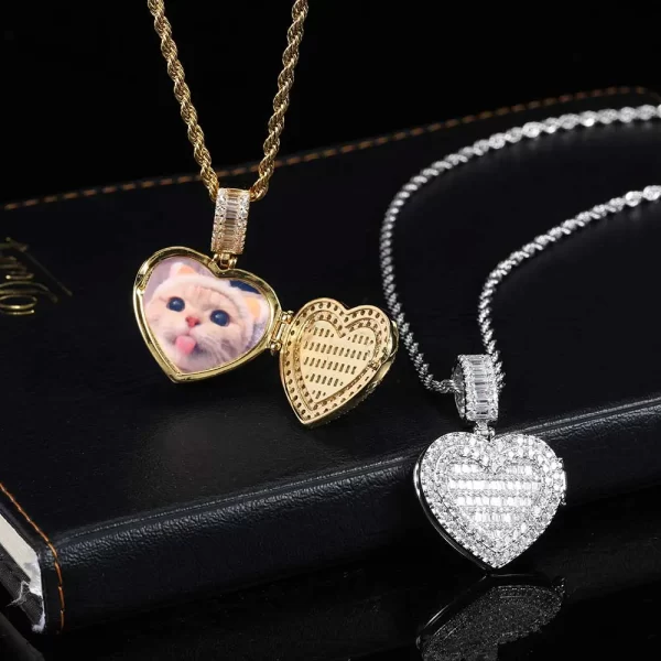 In White Gold, the Custom Iced Flip Cover Heart Pendant is a stunning combination of elegance and sentiment. Measuring 31mm, this pendant sparkles with VVS simulated diamonds and features a unique flip cover design that reveals a hidden photo or message. The White Gold plating offers a sleek and refined look, making it suitable for both casual wear and formal events. Hypoallergenic, scratch-resistant, and waterproof, this pendant ensures that your style stays flawless while keeping your most cherished memories close.