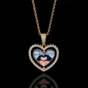 Capture memories with the Custom 3D Spinner Heart Pendant in Yellow Gold. This 40mm pendant allows you to display two custom pictures, one on each side, spinning within a heart-shaped frame for added flair. The high-polish finish enhances its elegance, while the hypoallergenic, waterproof, and scratch-resistant features ensure durability for daily wear. This Yellow Gold pendant is perfect for personal keepsakes or gifting. Whether you're showing off cherished memories or adding a unique touch to your Hip-Hop style, this pendant offers timeless appeal.