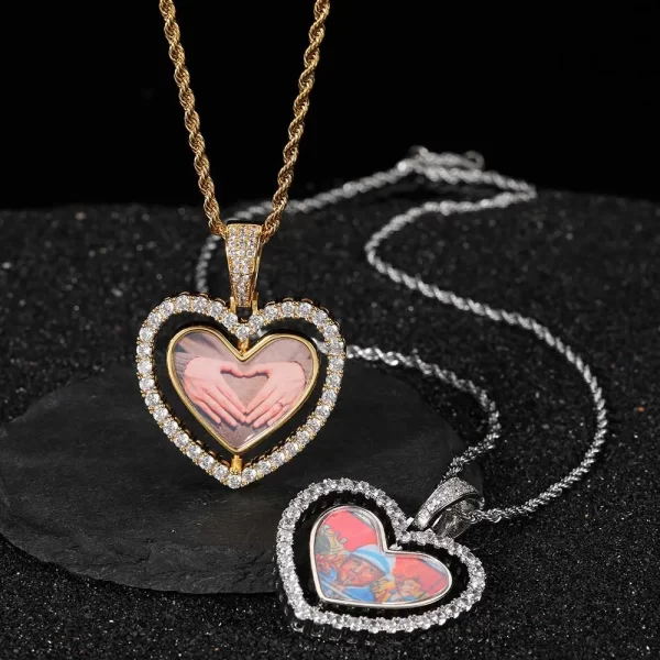 The White Gold Custom 3D Spinner Heart Pendant is the perfect way to keep your most cherished memories close. This 40mm pendant showcases a photo on both sides of a spinning heart frame, offering a unique and personalized style. Hypoallergenic and scratch-resistant, it¡¯s designed for both special occasions and everyday wear. The White Gold plating gives it a sleek finish, making it an ideal accessory for casual and formal outfits. A perfect gift for those who want to add a personal, sentimental touch to their Hip-Hop jewelry collection.