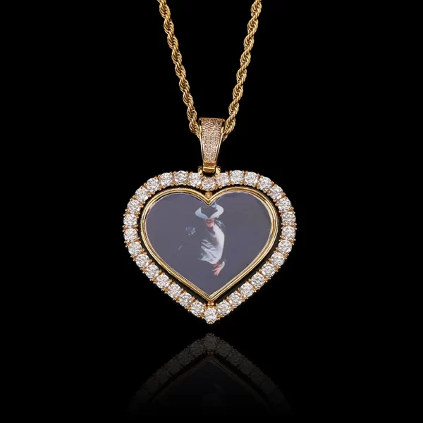 This Yellow Gold Custom 3D Spinner Heart Picture Pendant lets you showcase two meaningful photos with its unique rotating design. Measuring 48mm, the pendant is plated with Yellow Gold and encrusted with VVS simulated diamonds, adding a luxurious touch. Hypoallergenic, scratch-resistant, and waterproof, it¡¯s perfect for gifting or keeping cherished memories close. Whether for casual wear or special events, this pendant offers both elegance and sentimentality in a beautiful Hip Hop style.