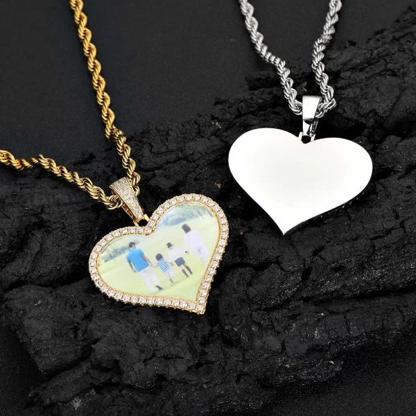 Celebrate your most cherished moments with this Custom Heart Picture Pendant, measuring 50mm. The large heart-shaped frame is perfect for showcasing a special photo that holds sentimental value. Yellow Gold-plated for a luxurious finish, this pendant is hypoallergenic, waterproof, and scratch-resistant, ensuring it remains a long-lasting keepsake. Whether for everyday wear or a special gift, this pendant captures both elegance and personal significance in one beautiful piece. A perfect token of love for anniversaries, Valentine’s Day, or any meaningful occasion.