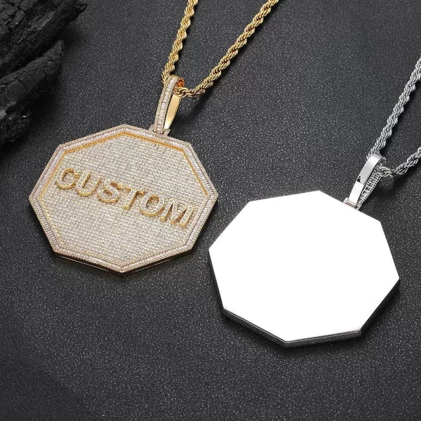 The Custom 3D Octagonal Letter Pendant in White Gold is designed for those who want to make a bold, personalized statement. With an 80mm octagonal design and a luxurious White Gold-plated finish, this pendant is both eye-catching and durable. Hypoallergenic and waterproof, it’s perfect for everyday wear or special occasions. The unique shape and polished finish make it a standout piece for adding personalized flair to your jewelry collection, blending modern design with Hip-Hop style.