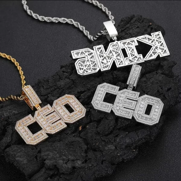 The Custom Baguette Letter Pendant in White Gold offers a sleek and luxurious way to personalize your jewelry. Featuring baguette-cut stones set in a white gold frame, this pendant is hypoallergenic and designed for comfort. It’s waterproof and durable, ensuring it stays flawless for daily wear. Perfect for adding a modern Hip Hop twist to any outfit.