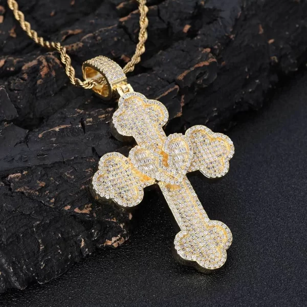 The Iced Heartbroken Cross Pendant in Yellow Gold combines love, faith, and a Hip-Hop edge. Featuring a broken-heart cross design adorned with VVS simulated diamonds, this pendant shines with both spiritual and stylish appeal. The Yellow Gold plating adds a warm glow to the bold design, making it perfect for anyone who wants to express their faith in a unique way. Waterproof, hypoallergenic, and scratch-resistant, it's designed for everyday wear and stands out as a meaningful gift or personal statement piece. Whether worn solo or layered, this pendant blends emotion with Hip-Hop culture seamlessly.