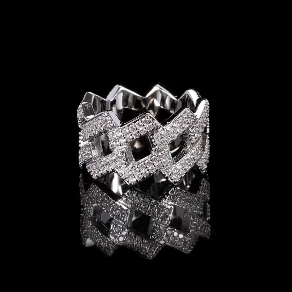 The Iced Diamond Cuban Ring in White Gold - 14mm offers a striking blend of Cuban link style and the brilliance of VVS Simulated Diamonds. Its wide 14mm band ensures it stands out in any collection, while the White Gold finish adds sophistication. Ideal for Hip Hop lovers who want to make a bold statement with their accessories.