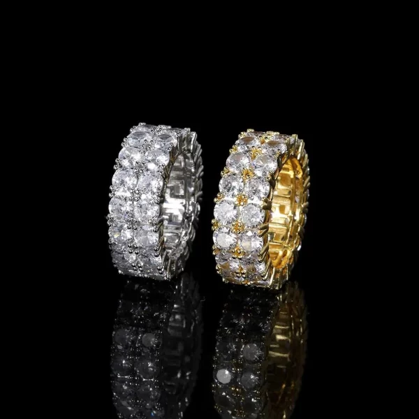 The 2 Layer Iced Prong Ring in White Gold offers double the brilliance with its stacked VVS Simulated Diamonds. This White Gold ring shines with luxury, making it the ideal accessory for those who love to stand out. Its sleek design adds sophistication, perfect for Hip Hop lovers who appreciate bold style.