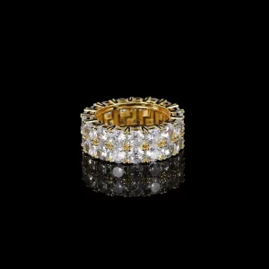 Take your look to the next level with the 2 Layer Iced Prong Ring in Yellow Gold. Featuring two layers of VVS Simulated Diamonds set in a bold Yellow Gold band, this ring delivers extra shine and luxury. Its stacked design makes it the perfect accessory for those who want to stand out with their Hip Hop-inspired jewelry.