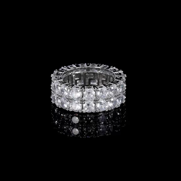 The 2 Layer Iced Prong Ring in White Gold offers double the brilliance with its stacked VVS Simulated Diamonds. This White Gold ring shines with luxury, making it the ideal accessory for those who love to stand out. Its sleek design adds sophistication, perfect for Hip Hop lovers who appreciate bold style.