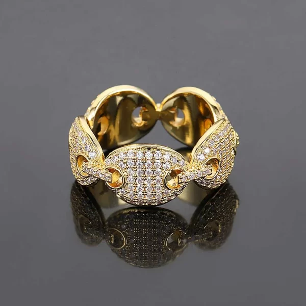 The Iced Prong Mariner Ring in Yellow Gold combines classic mariner link design with the brilliance of VVS Simulated Diamonds. The Gold Plated finish adds an element of luxury, making this ring a must-have for any Hip Hop jewelry collection. Its sturdy design ensures durability while keeping your style fresh.