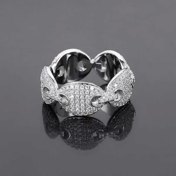 The Iced Prong Mariner Ring in White Gold delivers a stunning blend of mariner link design and VVS Simulated Diamonds. Its White Gold finish ensures it shines brilliantly, while its sturdy construction makes it both stylish and durable. Ideal for adding a touch of elegance to your Hip Hop jewelry collection.