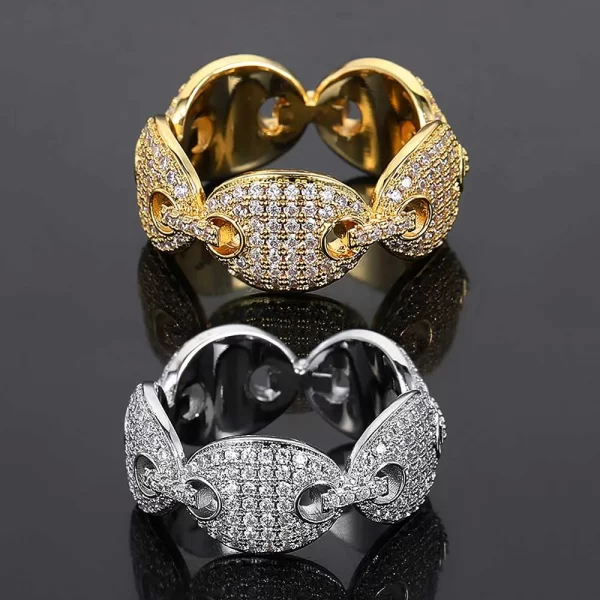 The Iced Prong Mariner Ring in Yellow Gold combines classic mariner link design with the brilliance of VVS Simulated Diamonds. The Gold Plated finish adds an element of luxury, making this ring a must-have for any Hip Hop jewelry collection. Its sturdy design ensures durability while keeping your style fresh.