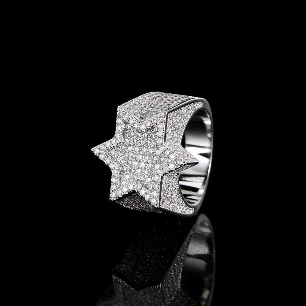 The Iced Hexagon Diamond Ring in White Gold combines bold design with high-end sophistication. Featuring VVS Simulated Diamonds set in a unique hexagon shape, this White Gold ring adds a modern twist to any Hip Hop-inspired look. Its geometric design ensures it stands out, making it the perfect accessory for those who love to blend elegance with boldness.