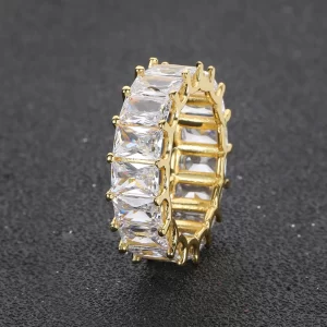 The 1 Layer Iced Square Ring in Yellow Gold offers a sleek, minimalist design with a square pattern adorned with VVS Simulated Diamonds. The luxurious Yellow Gold finish adds a touch of refinement, making this ring perfect for those who appreciate understated elegance in their Hip Hop jewelry collection. The square design brings balance and structure, making it versatile for any occasion.