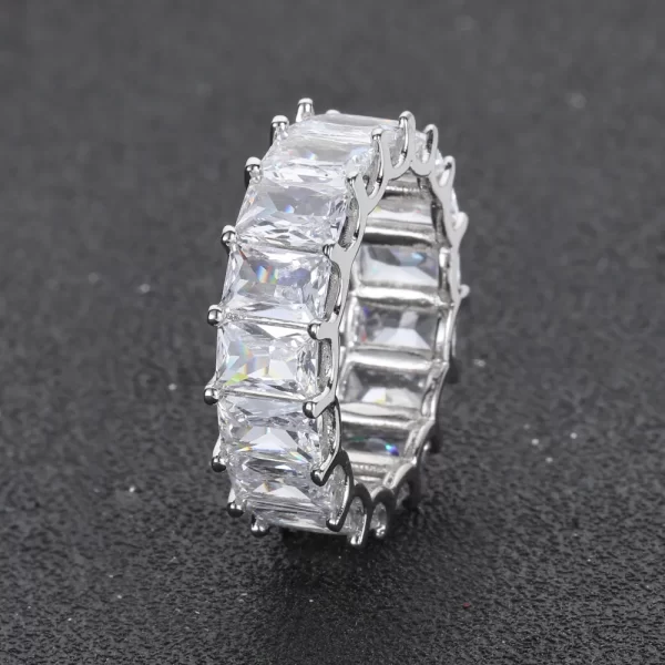 The 1 Layer Iced Square Ring in White Gold combines minimalist style with high-end elegance. Featuring VVS Simulated Diamonds set in a square design, this White Gold ring adds a sleek, modern look to any outfit. Perfect for Hip Hop lovers who appreciate understated luxury, this ring is versatile enough for both casual and formal settings.