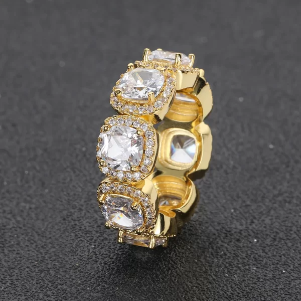 The Iced Bling Diamond Ring is all about luxury. Featuring VVS Simulated Diamonds meticulously set in a Yellow Gold Plated band, this ring gives off an eye-catching sparkle. Whether for everyday wear or special occasions, it adds that perfect touch of bling to elevate any outfit. Its sleek design is ideal for those who love Hip Hop aesthetics combined with luxury and durability. The detailed craftsmanship ensures this piece will stand out wherever you go, offering a timeless addition to your jewelry collection.