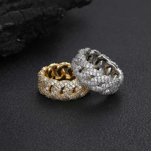 The Iced Prong Bubble Cuban Ring in Yellow Gold - 10mm adds a playful twist to the traditional Cuban link style. Featuring VVS Simulated Diamonds and a luxurious Yellow Gold finish, this 10mm ring offers both fun and elegance. The bubble texture adds dimension to the ring, making it perfect for Hip Hop fans who want to stand out with unique jewelry.