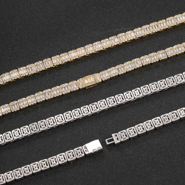 Shine with the Iced Square Tennis Chain in Yellow Gold. This sleek 8mm Tennis Chain is designed with square-set VVS Simulated Diamonds for maximum brilliance. The Yellow Gold finish adds a luxurious and rich touch, making it a standout accessory whether layered or worn solo. Its 8mm width ensures durability and style, offering a modern take on the classic tennis chain design. Add this to your collection for an elegant yet bold look that never fades.